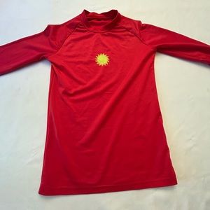 Red Child’s sun guard/rash guard.